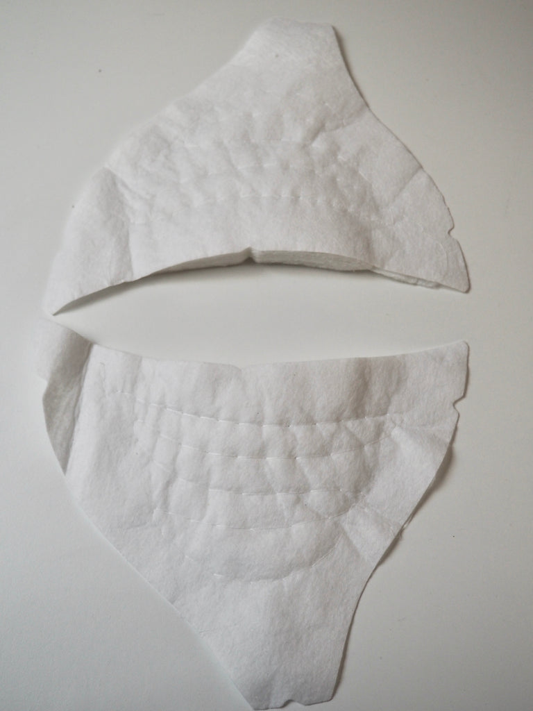 Shaped White Shoulder Pads