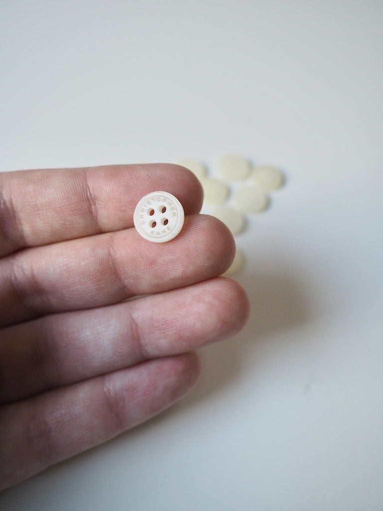 Branded Cream Buttons 11mm