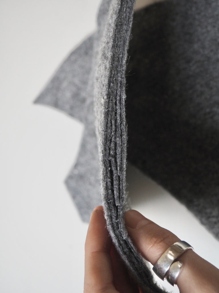 Shaped Grey Shoulder Pads