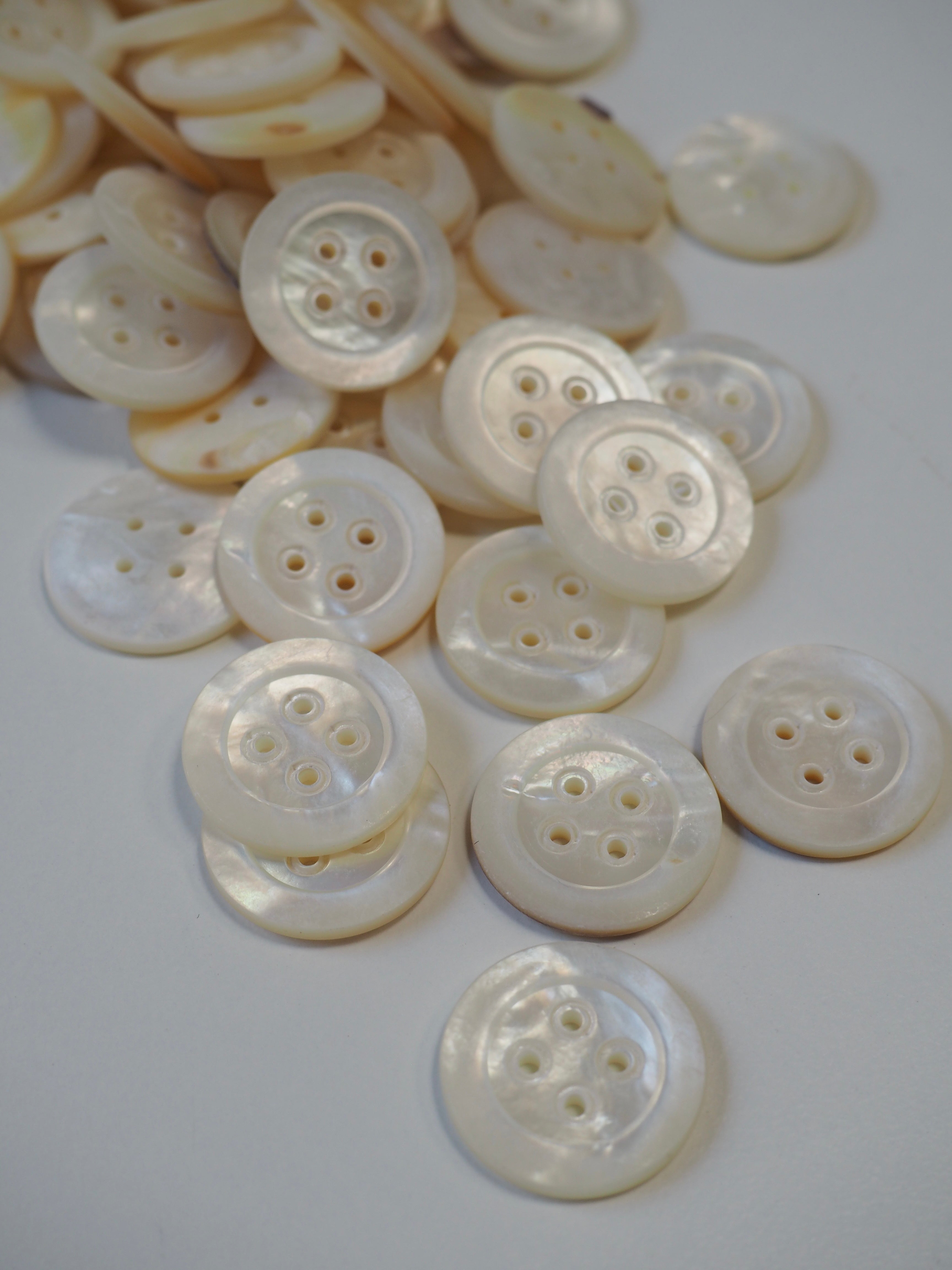 1 White Pearl Shell Round Buttons, Pack of 4. Item #655A – The